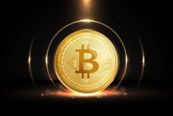 Moneda Bitcoin color dorado.