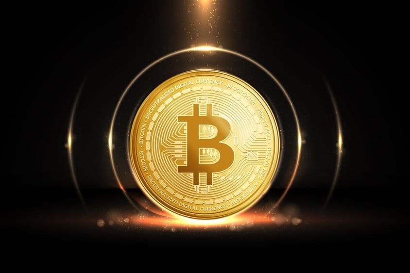 Moneda Bitcoin color dorado.
