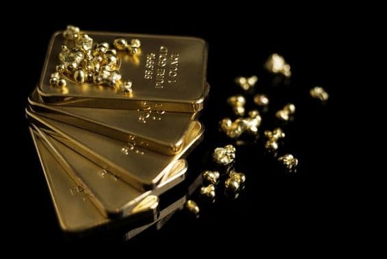 Barras de oro y algunas migas de oro.