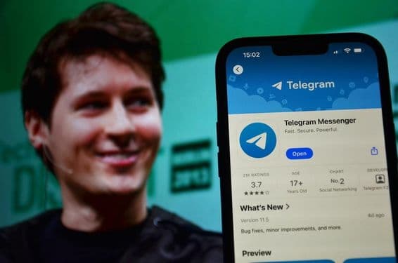 Logo de Telegram visible al fondo con el CEO Pavel Durov.