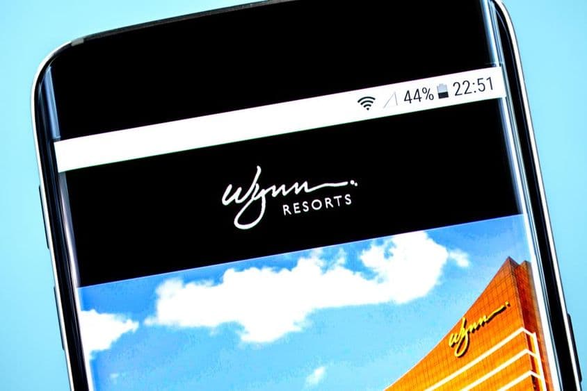 Logo de Wynn Resorts mostrado en la pantalla de un smartphone.
