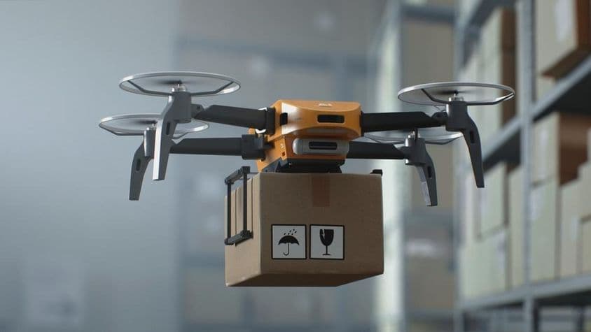 Dron UAV sin piloto entregando caja de cartón.